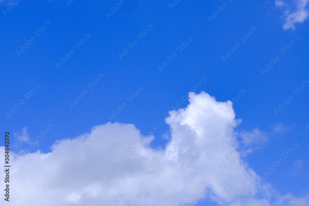Beautiful blue sky with white gorgeous fluffy cloudy flowing with the wind Beautiful blue sky with white gorgeous fluffy cloudy flowing with the wind