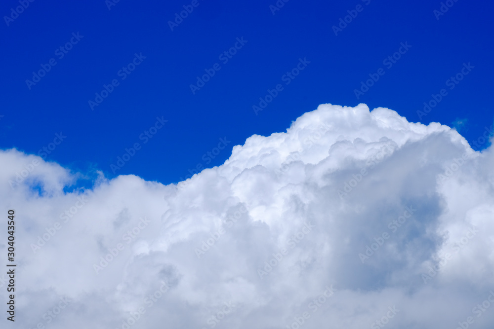 Beautiful blue sky with white gorgeous fluffy cloudy flowing with the wind Beautiful blue sky with white gorgeous fluffy cloudy flowing with the wind