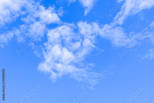 Beautiful blue sky with white gorgeous fluffy cloudy flowing with the wind