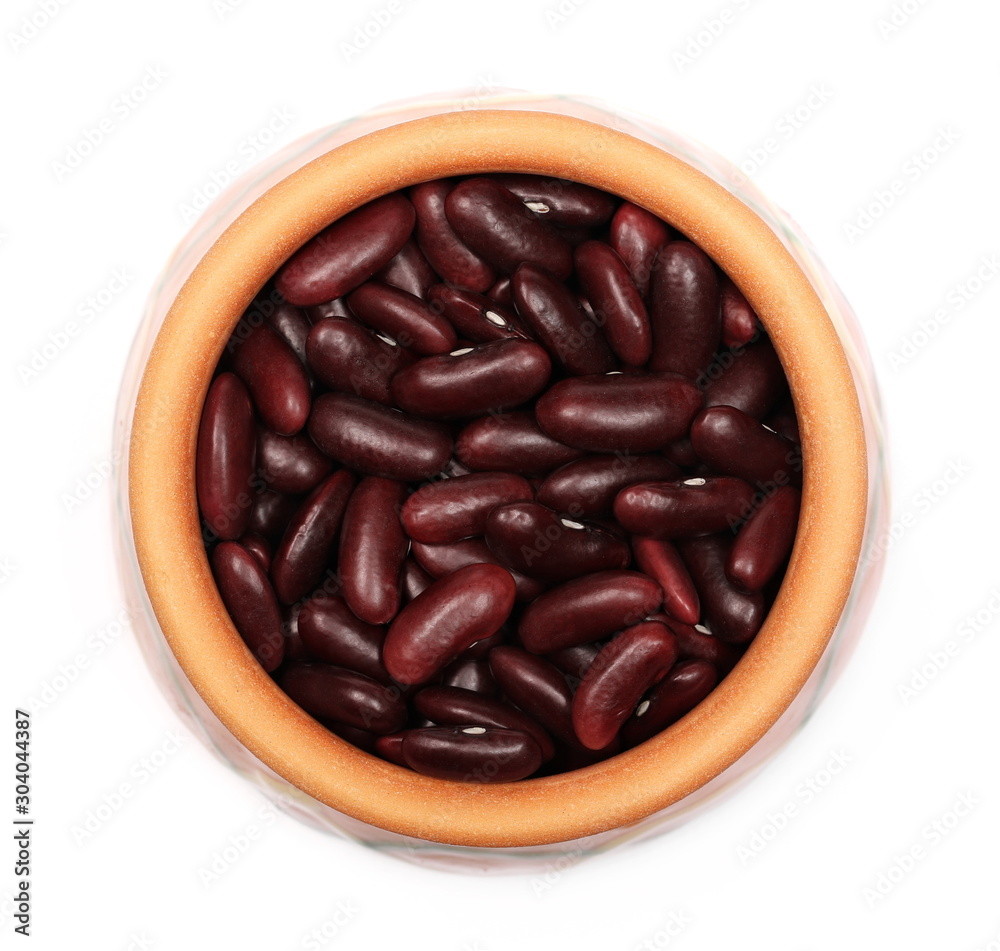 Red kidney beans in clay pot, bowl isolated on white background, top view Red kidney beans in clay pot, bowl isolated on white background, top view