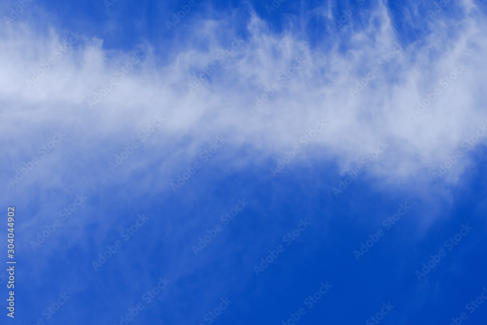 Beautiful blue sky with white gorgeous fluffy cloudy flowing with the wind Beautiful blue sky with white gorgeous fluffy cloudy flowing with the wind