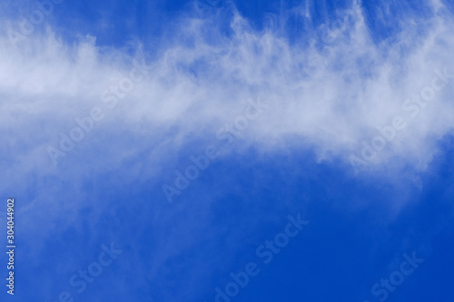 Beautiful blue sky with white gorgeous fluffy cloudy flowing with the wind