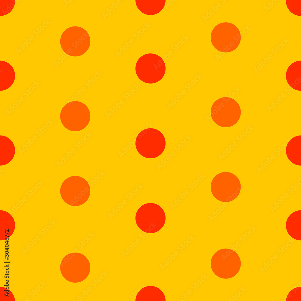 Abstract polka dot seamless pattern. Red and orange circles on yellow background