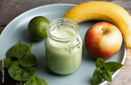 Homemade healthy smoothy made of spinach,banana and apple.