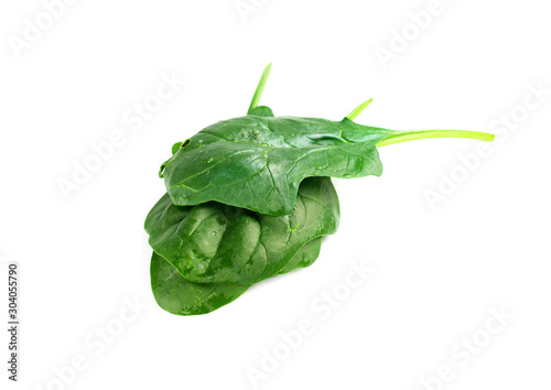 Leaf of green fresh spinach isolated on a white background. Nutrition plan