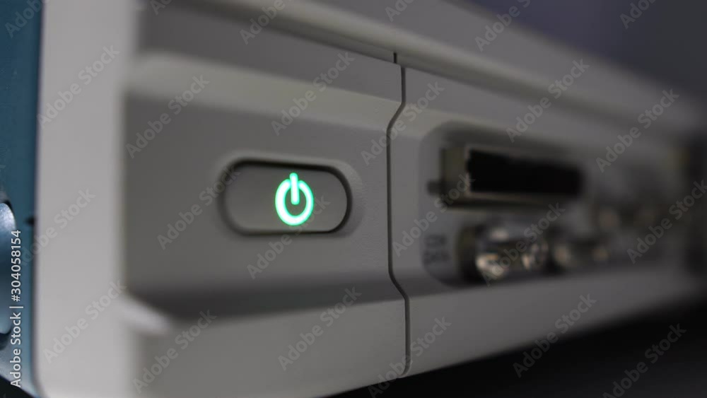 Close-up finger turn on the switch of the oscilloscope footage 4K Close-up finger turn on the switch of the oscilloscope footage 4K