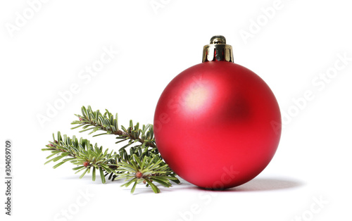 Christmas tree branches and Christmas balls on white background