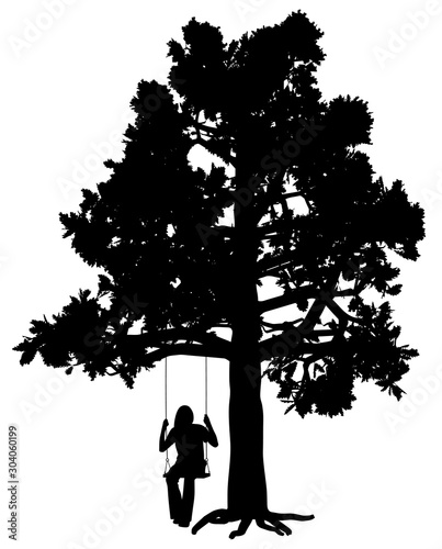 Young woman is swinging on a swing under oak tree