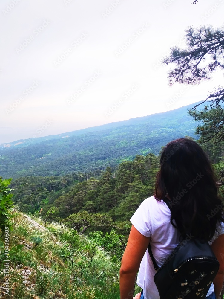 girl on the top of mountain