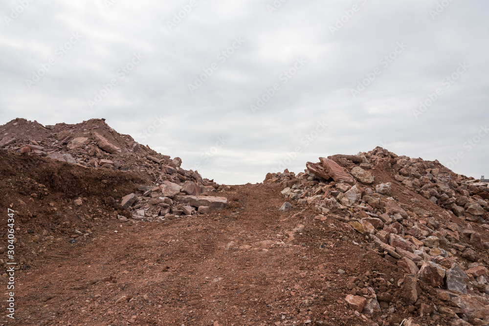 The hills of engineering materials piled up on the construction site
