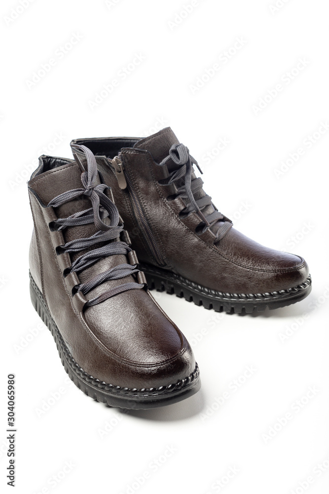 brown demi boots on white background