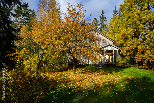 Old House with nice garden in autumn. Suburb of Helsinki, Finland.