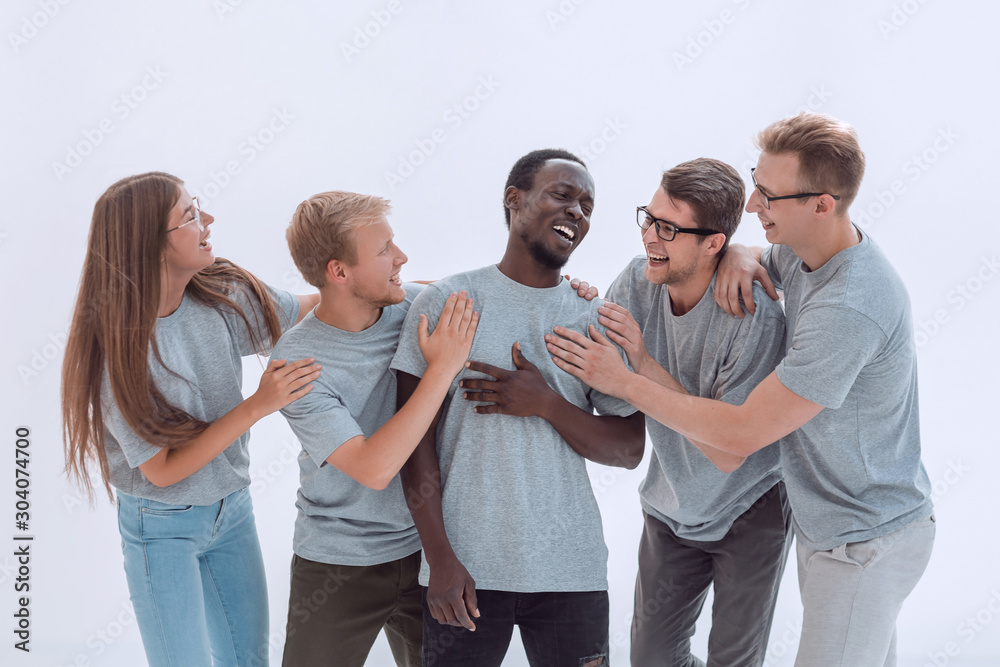 happy friends standing together . isolated on white happy friends standing together . isolated on white