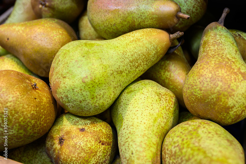 pears in a wooden box, market. Farm eco products. Rome, Italy.