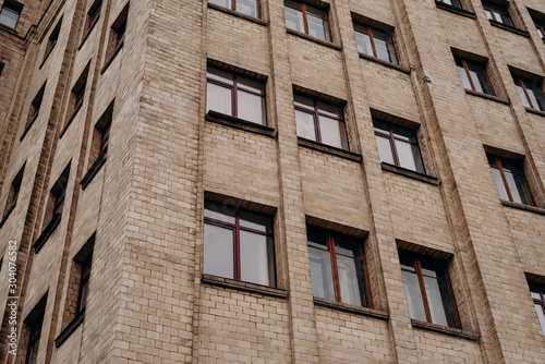 Brick wall and windows of building