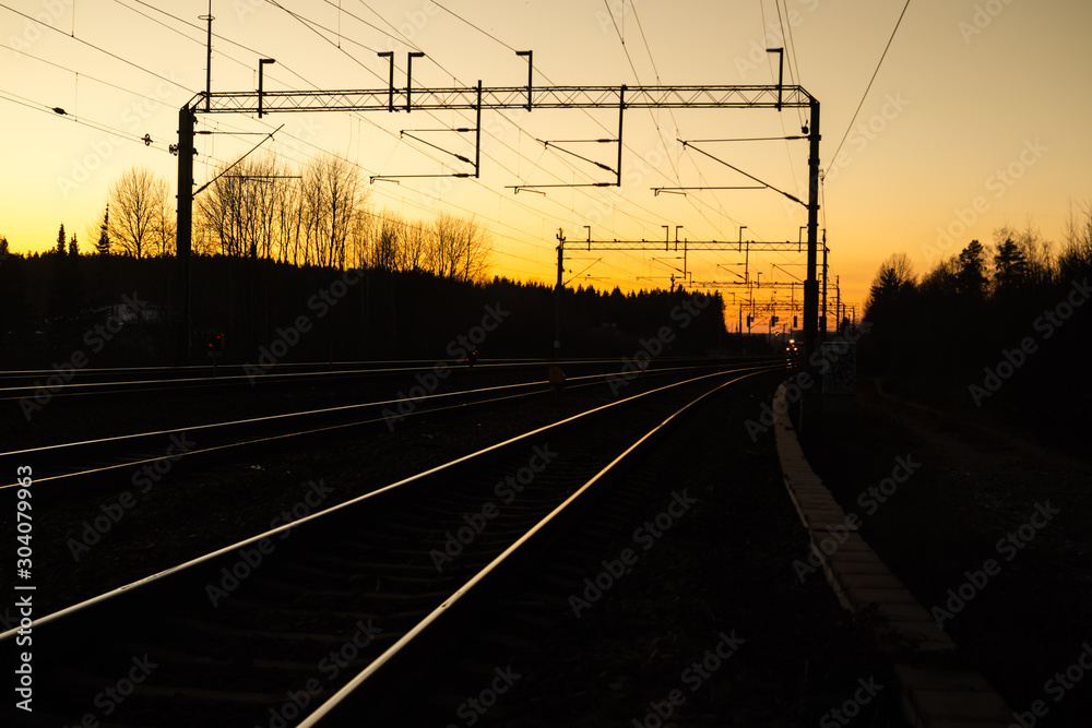 Fototapeta premium Beautiful sunset at railway in Kouvola, Finland.