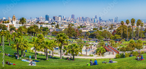 Canvas Print Panoramic view of local people enjoying the sunny summer weather at Mission Dolo