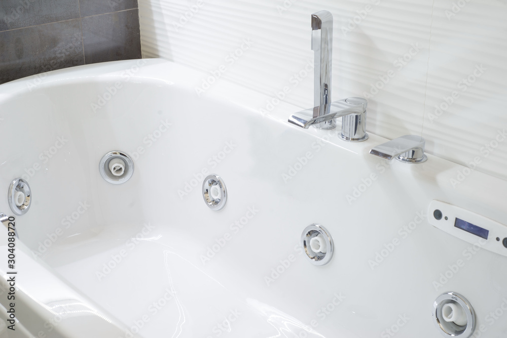 Fototapeta premium bathroom close-up. Large white bathroom in a modern interior