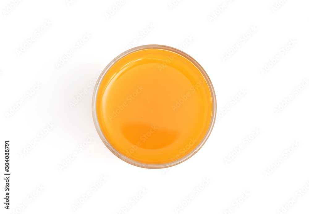 Glass of orange juice isolated on white background, top view, flat lay, copy space