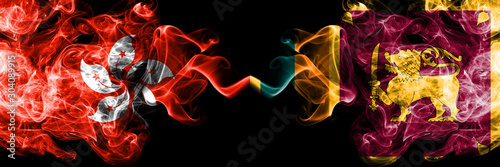 Hong Kong, China vs Sri Lanka, Sri Lankan smoky mystic states flags placed side by side. Concept and idea thick colored silky abstract smoke flags photo