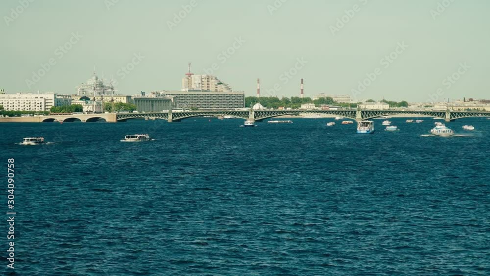Tourists on the deck of a pleasure tourist ship. People see the sights of the city from the Neva River, the canals. Tourists on the deck of a pleasure tourist ship. People see the sights of the city from the Neva River, the canals.
