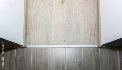 Photography Installation of threshold indoors. Renovation works in the flat.