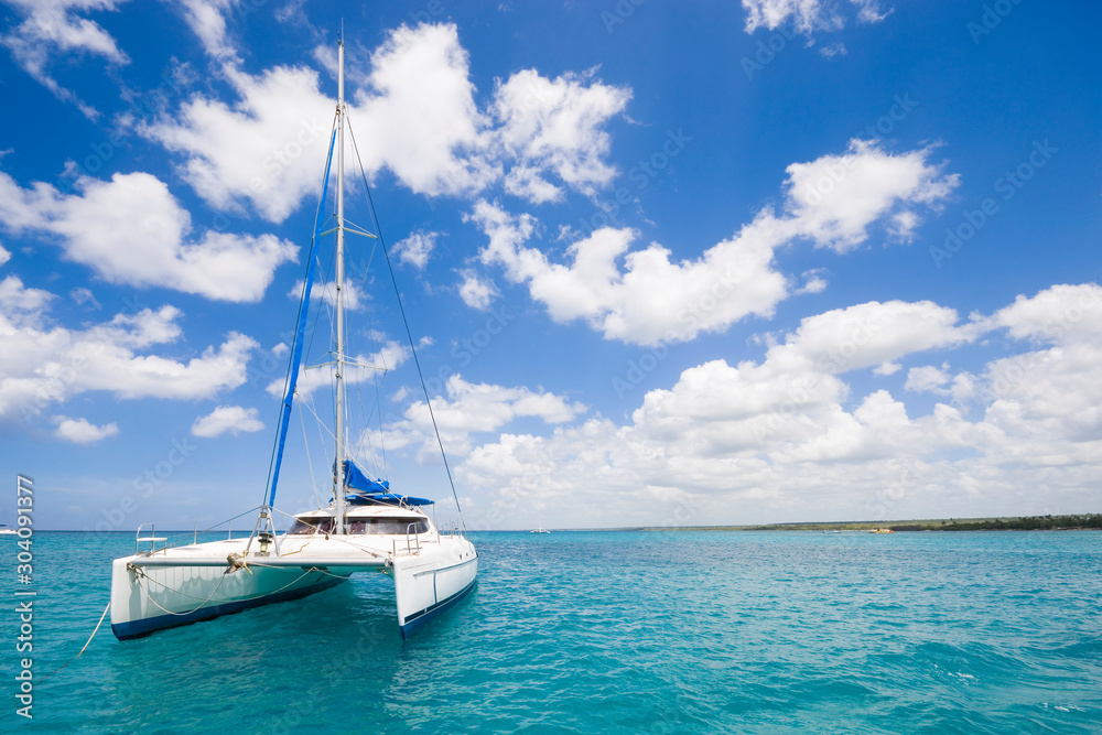 Luxury yacht anchored on turquoise water of Caribbean Sea, Dominican Republic