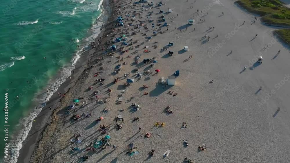 Drone Tilt up shot of Miami beach in slow motion Drone Tilt up shot of Miami beach in slow motion