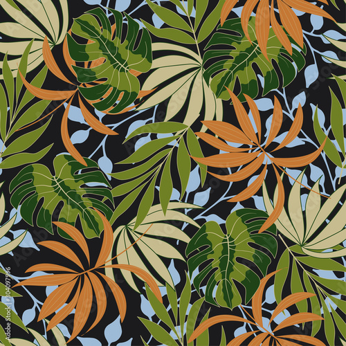 Original seamless tropical pattern with bright orange and green plants and leaves on a black background. Tropical botanical. Summer colorful hawaiian seamless pattern with tropical plants.