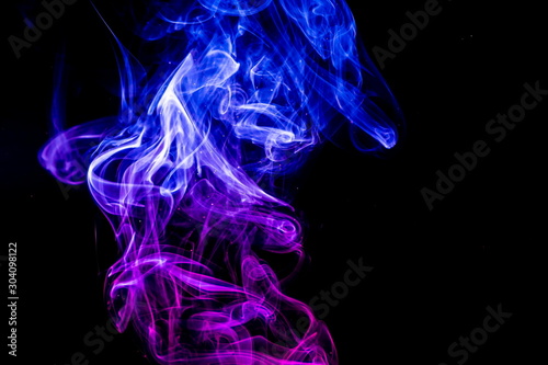 Fototapeta Naklejka Na Ścianę i Meble -  Colored smoke on black background