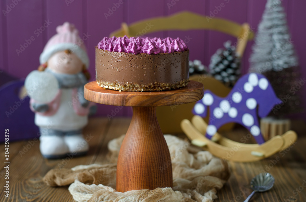 Chocolate Cheesecake with Cream and New Year's Decor