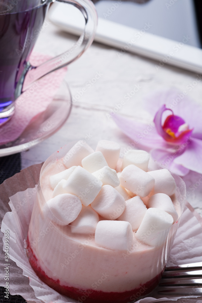 life style set at meeting in cafe.Thai blue, Butterfly pea tea served with panna cotta cake.