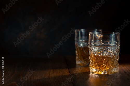 Whiskey in glass with ice