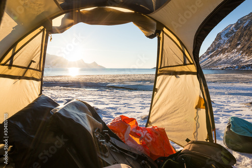 Camping on Lofoten islands in Norway in winter