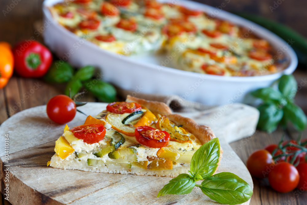Quiche with tomatoes, spinach and feta cheese Quiche with tomatoes, spinach and feta cheese