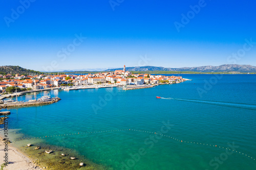 Croatia, Island of Murter, beautiful coastal touristic town of Betina on Adriatic sea, drone aerial view