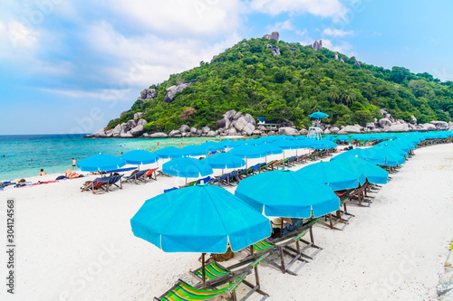 Outdoors scenic landscape vacation beach with beach chair and sun umbrella for traveler Koh Nang Yuan, Landmark tourist travel Samui Thailand summer holiday, Tourism beautiful destination place Asia