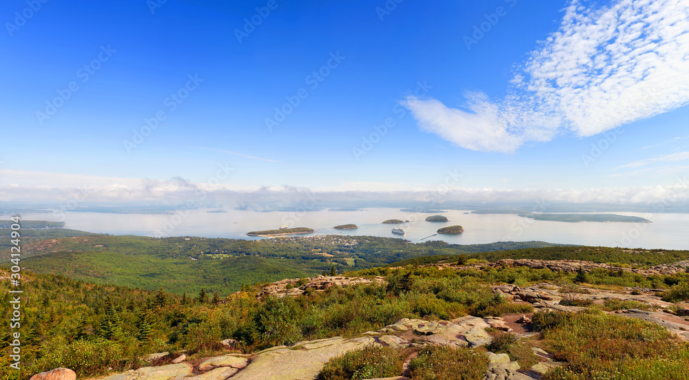 Fototapeta premium Panoramic view of Bar Harbor with cruise ships and cluster of small islands from Cadillac Mountain in Acadia National Park, Maine USA