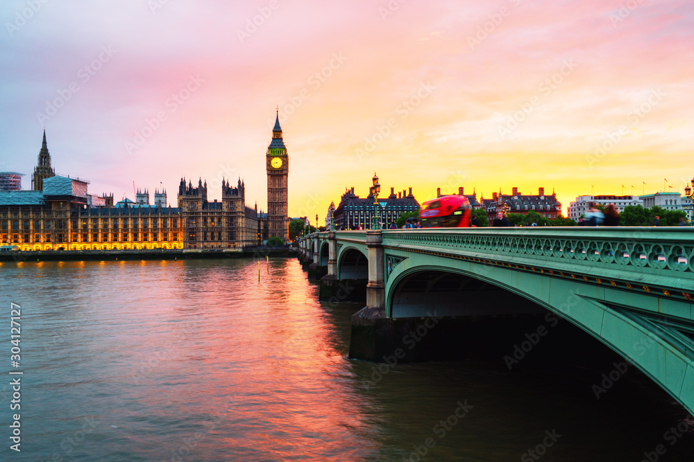 Fototapeta premium Sunset over the city of London, UK. Colorful sky behind Westminster and Big Ben