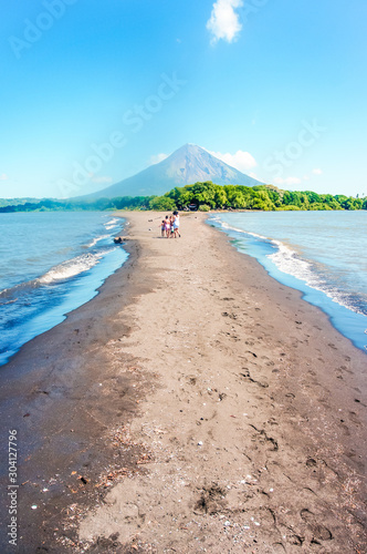 Way beach to the island with the gran volcano photo