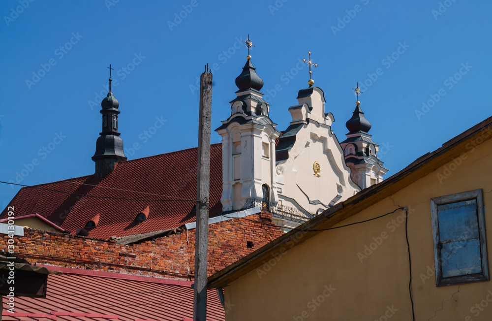 Pinsk, Belarus, August 26, 2019.The bell tower and the building of the Assumption Cathedral of the Blessed Virgin Mary in Pinsk. Pinsk, Belarus, August 26, 2019.The bell tower and the building of the Assumption Cathedral of the Blessed Virgin Mary in Pinsk.