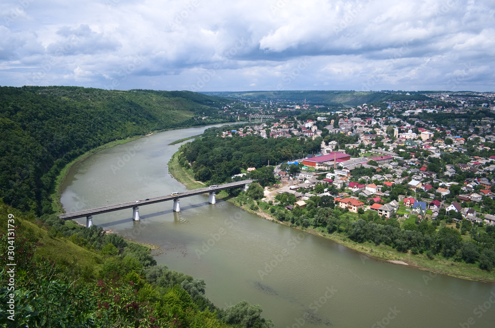 Aerial view of Dniester canyon and bridge across Dniester river to Zalishchyky town. Ukraine.