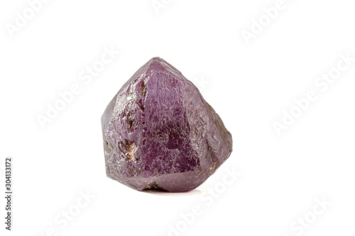 macro mineral stone alexandrite red - violet in daylight on a white photo