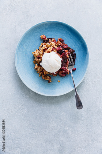 Wallpaper Mural Overhead view of plum crisp with ice cream served on plate Torontodigital.ca