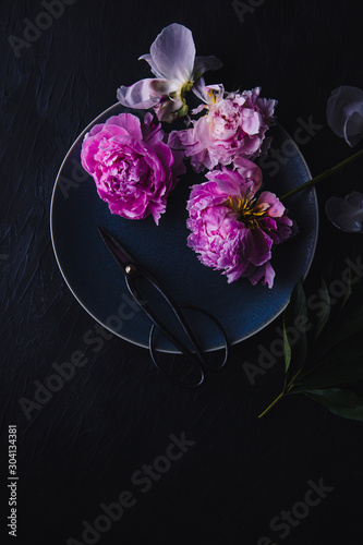 Wallpaper Mural Overhead view of peony flowers and scissors on plate Torontodigital.ca