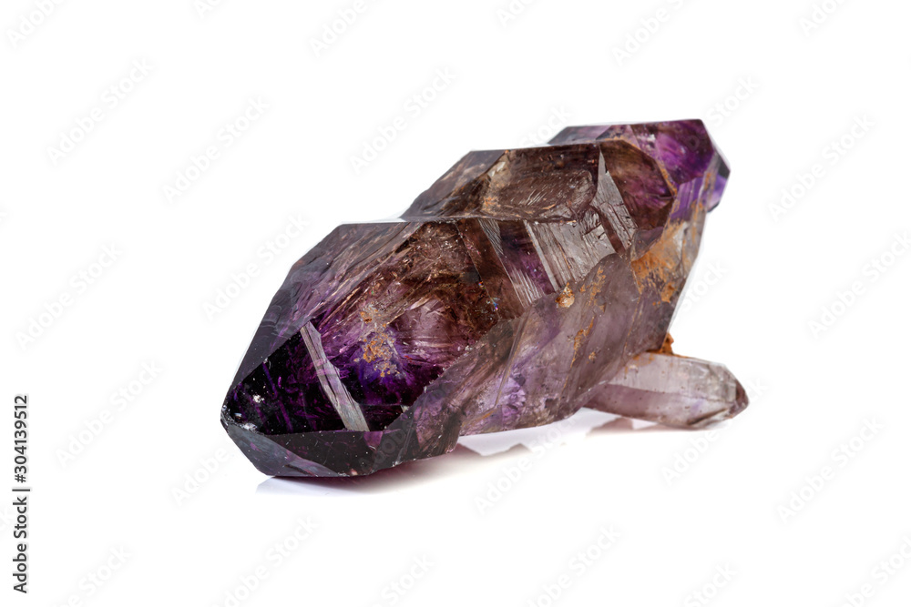 macro mineral stone Amethyst on smoky quartz on a white background macro mineral stone Amethyst on smoky quartz on a white background