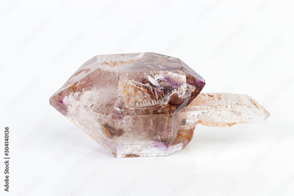 macro mineral stone Amethyst on smoky quartz on a white background macro mineral stone Amethyst on smoky quartz on a white background