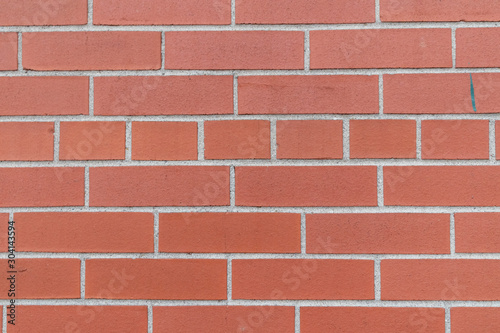 Red brick wall closeup texture