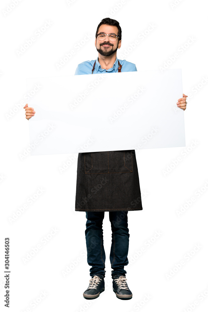 Man with apron holding an empty placard Man with apron holding an empty placard