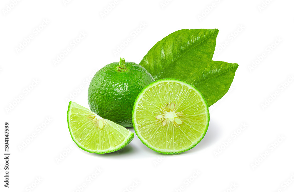 Natural fresh lime with water drops and sliced, green leaf isolated on white background with clipping path